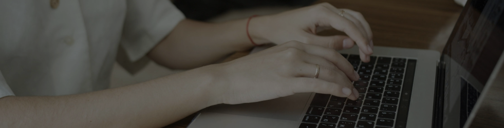 Blog banner showing a person using a laptop, symbolising expert wellness articles and updates on the Brit Finds desktop site