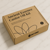 Ancient Essence Castor Oil Kit box placed on white and grey marble background — highlighting premium packaging and clean natural design for desktop view
