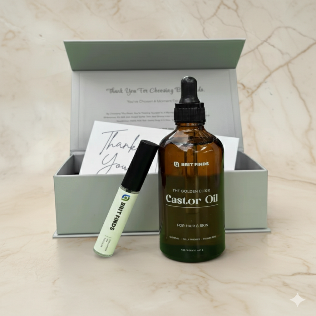 Open box display of 100ml castor oil with bottle, eyelash tube, and thank-you card arranged on a marble background, showcasing the complete natural beauty set for hair, skin, lash, and brow nourishment.