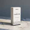 200 ml Castor Oil box in white color placed on a white and grey marble surface — clean and minimal product display 
