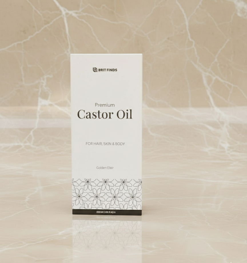 Closed box display of 200ml castor oil placed on a marble surface with a matching marble background, showcasing the elegant and premium packaging of the natural castor oil product.