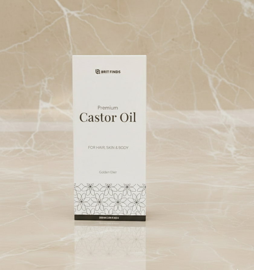 Closed box display of 200ml castor oil placed on a marble surface with a matching marble background, showcasing the elegant and premium packaging of the natural castor oil product.